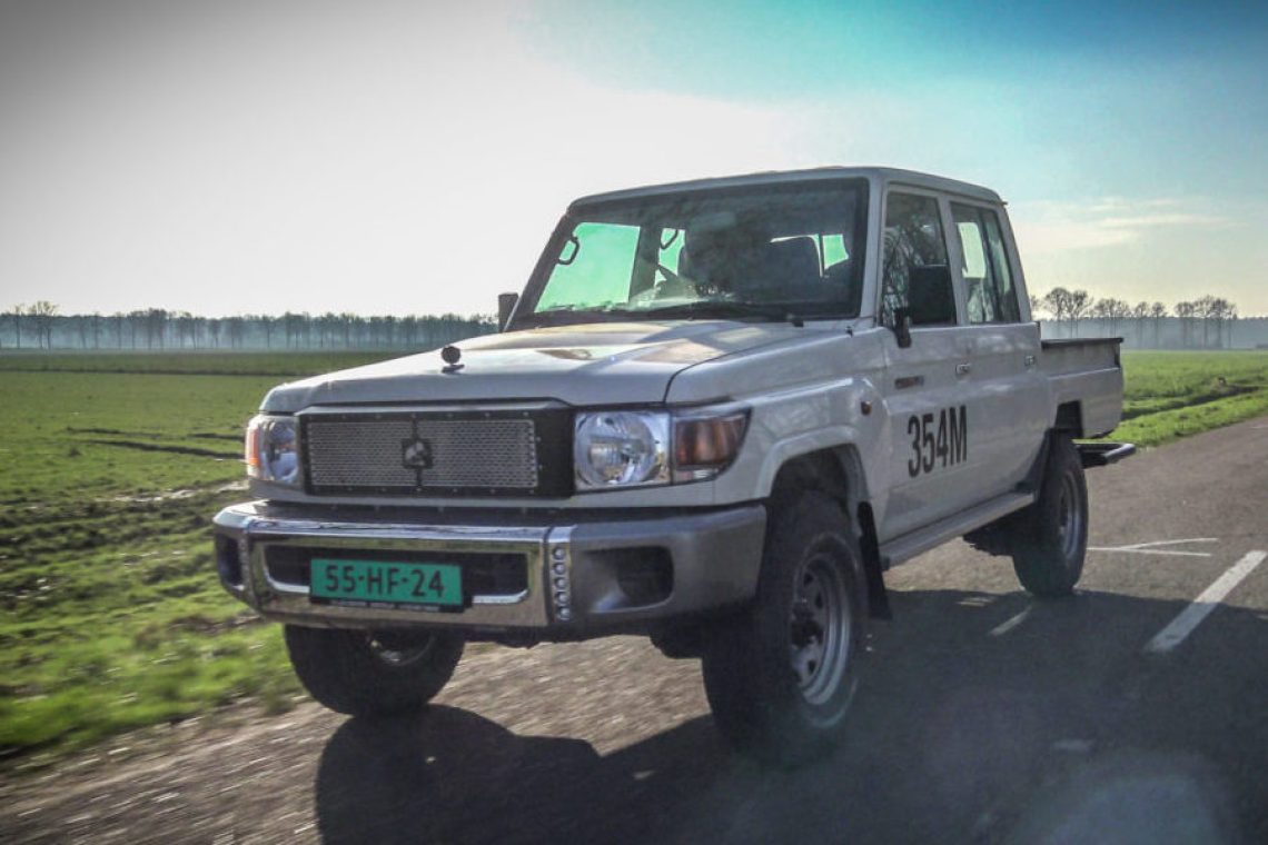 A Tembo electric light vehicle is on the road